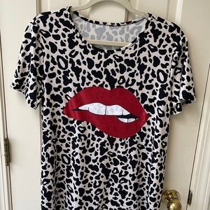 EUC, worn once. Cheetah print boutique top. Sz lg